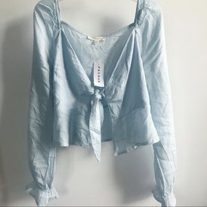 Light blue long-sleeve tie top